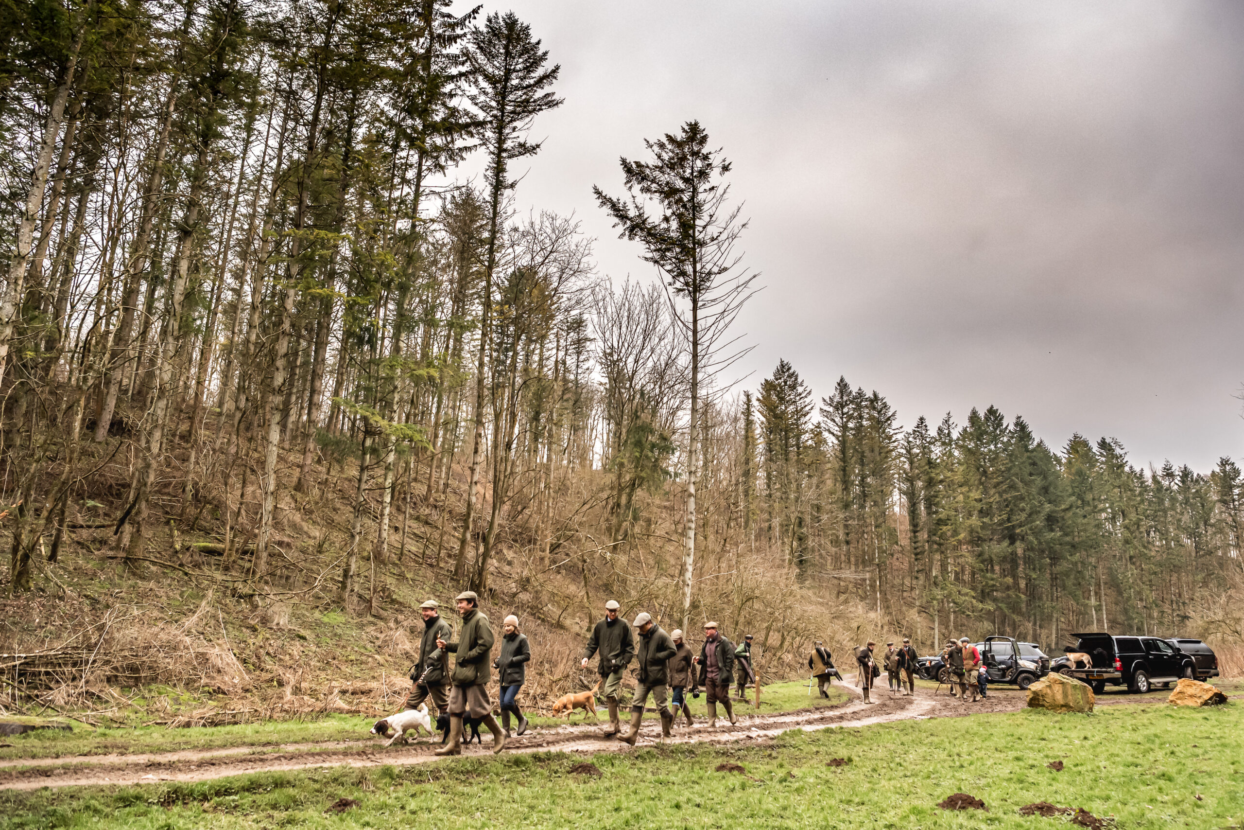Team of guns walking to their pegs
